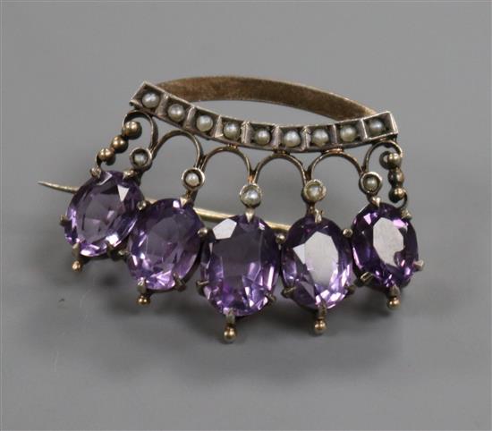 A 19th century yellow metal, amethyst and split pearl set coronet brooch, 30mm.